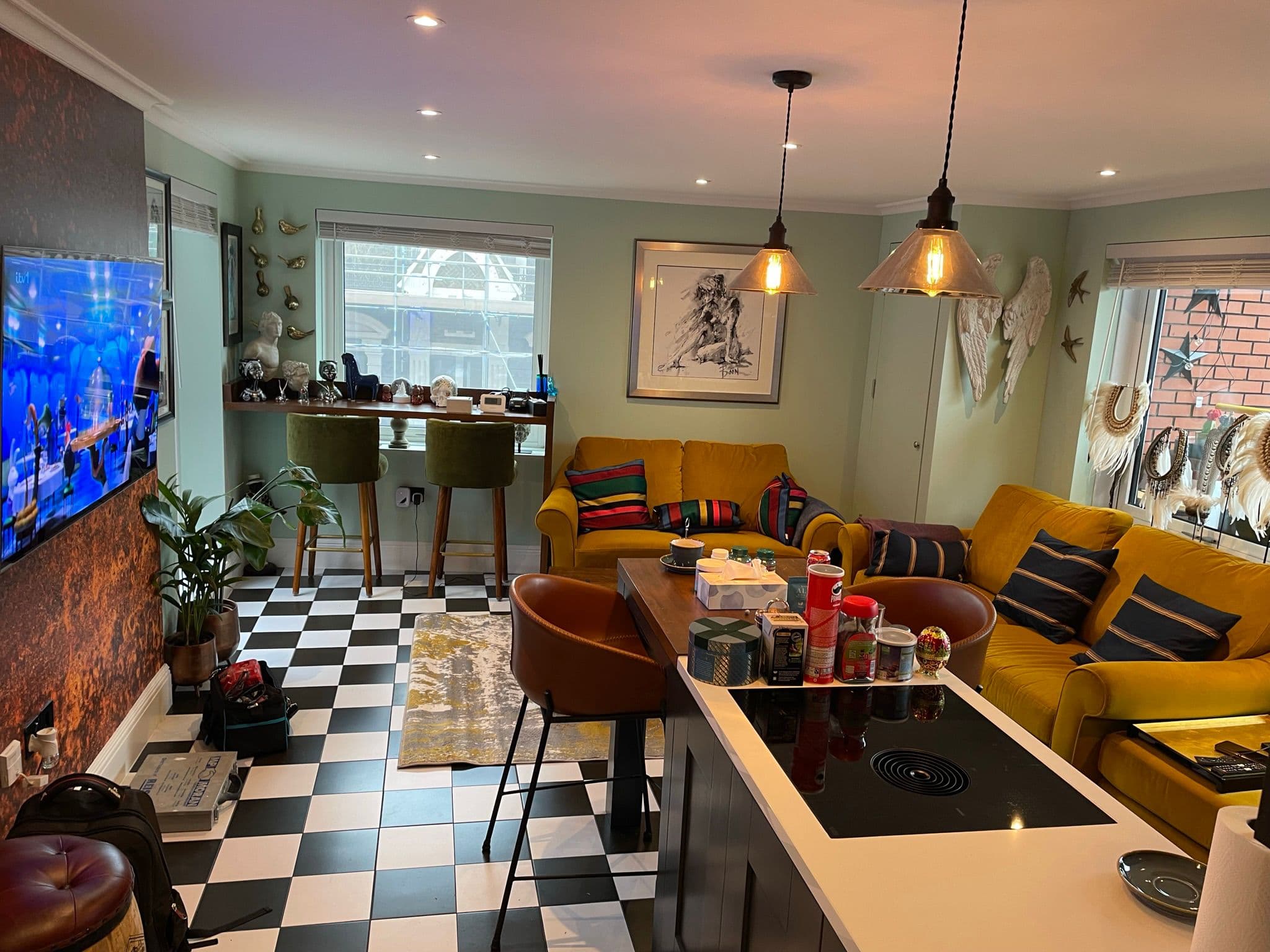 Kitchen and living space with chequerboard flooring