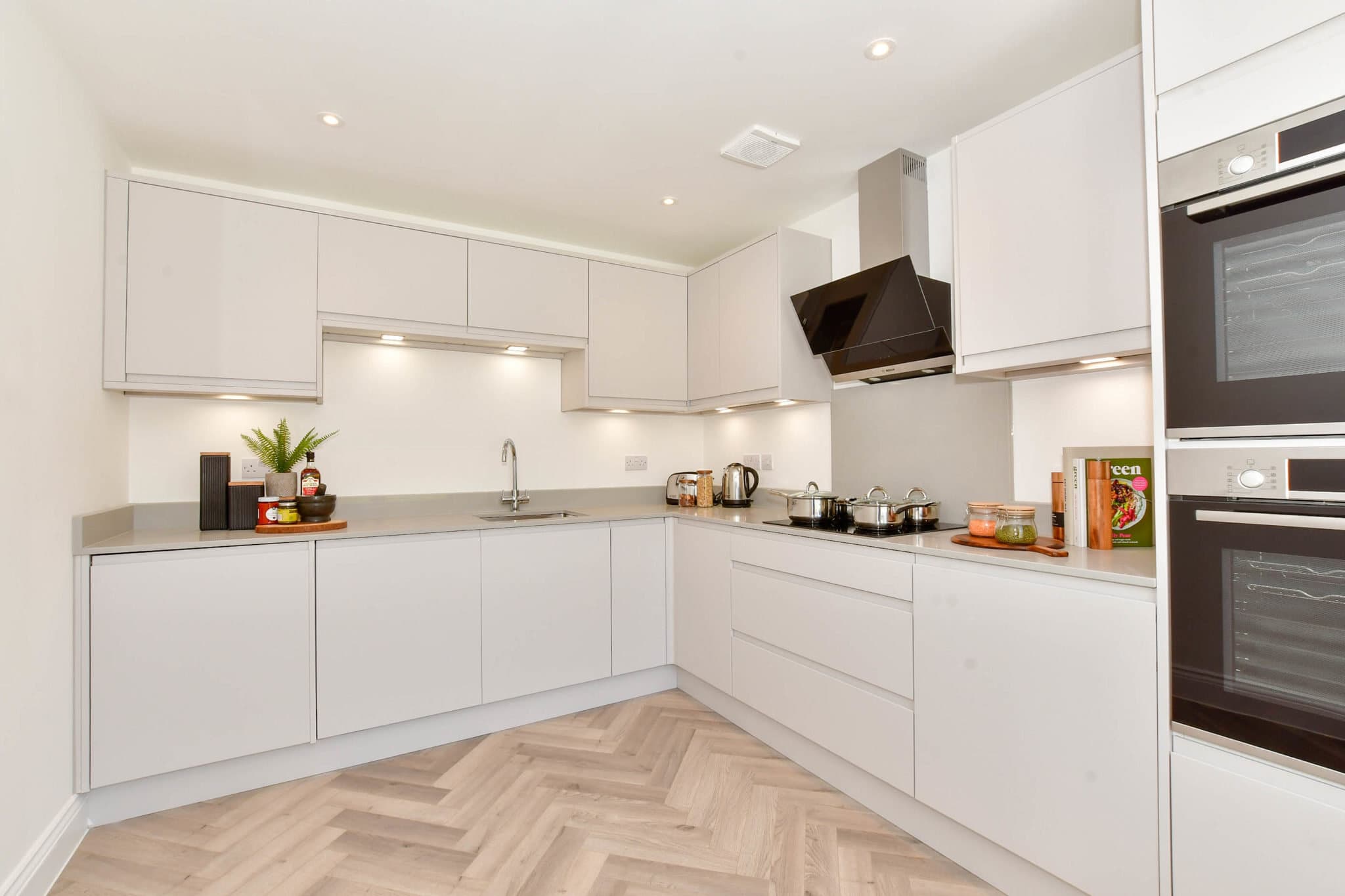 Bespoke kitchen with herringbone floor